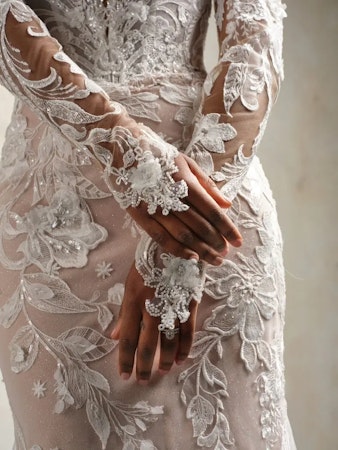 Bride wearing princess wedding dress Nyjah by Sottero and Midgley.