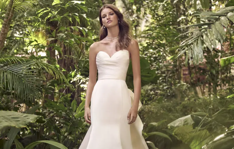 Bride In A More Sustainable Wedding Dress Called Hilo Marie By Maggie Sottero