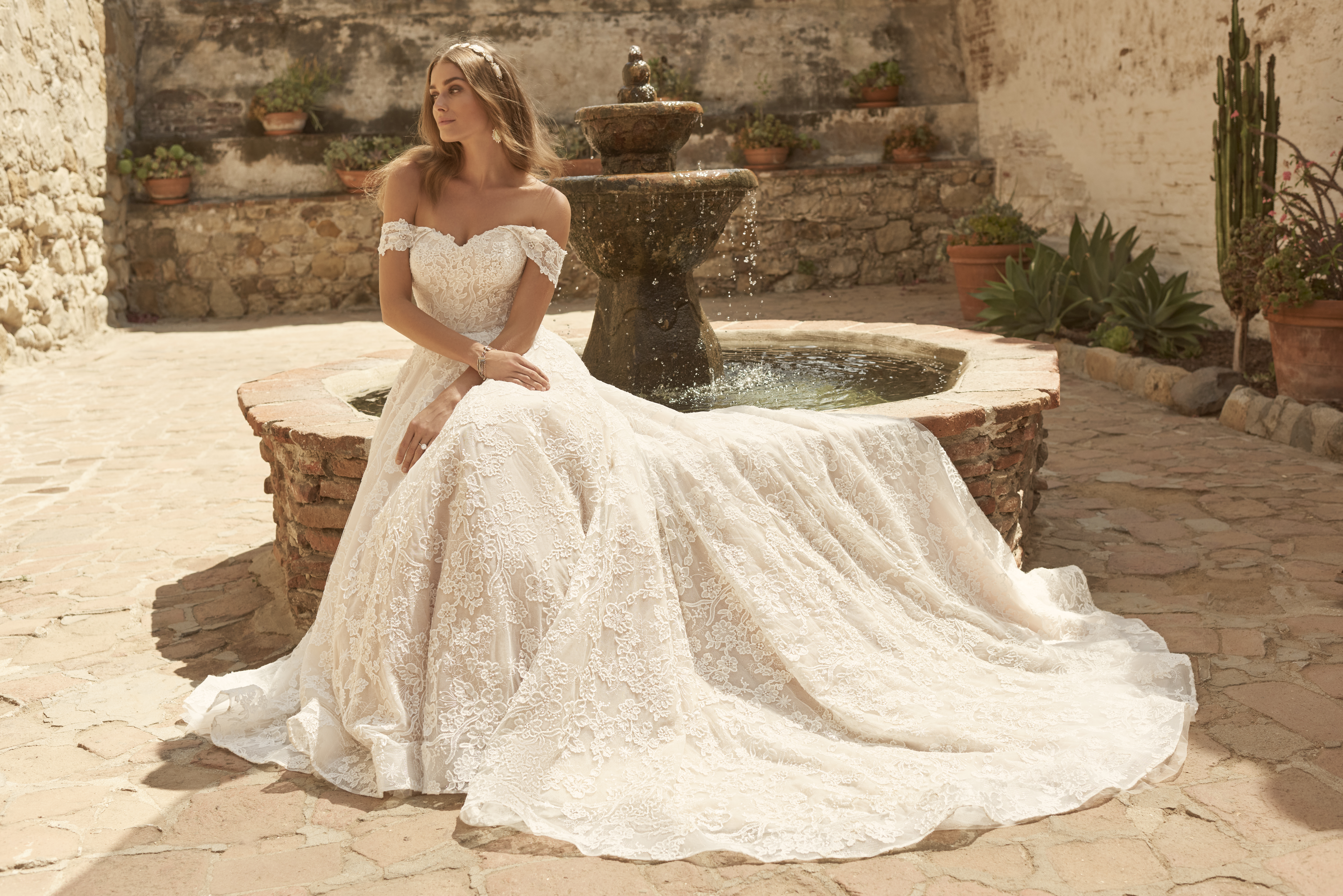 15 Ethereal FlowerInspired Wedding Dresses For Your White Garden Wedding   Praise Wedding