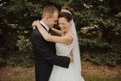 Taylor Lynette bride wearing a crown and hugging groom
